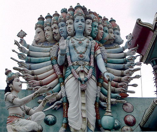 Krishna manifesting his full glory to Arjuna