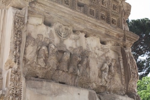 The Arch of Titus, Rome, depicting the Roman triumph at Jerusalem.