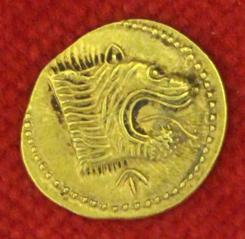 Moneda de oro etrusca