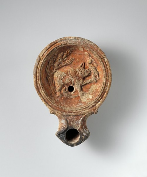 Lámpara de aceite de terracota romana con una imagen de rinoceronte